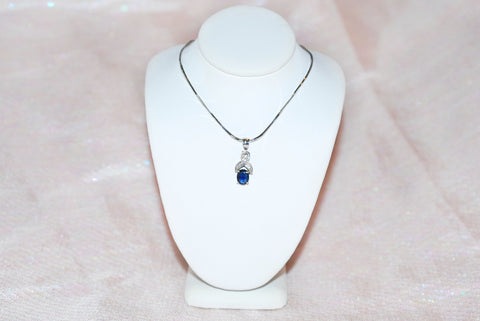 Sapphire Pendant with Diamond Ribbon