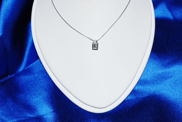 Emerald Cut Diamond Pendant in White Gold